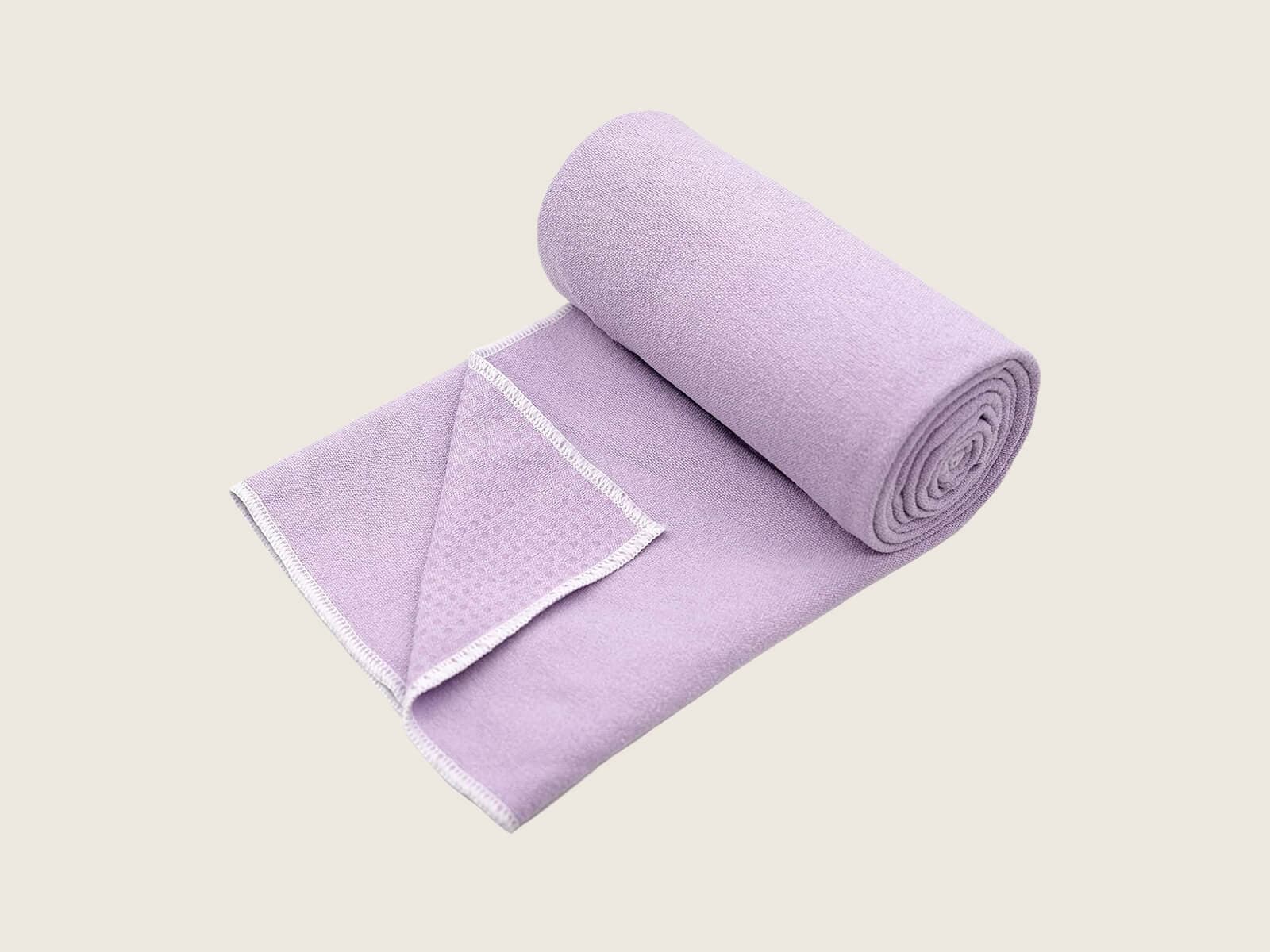 Eunzel hot yoga towel showing silicone grip dots across the surface